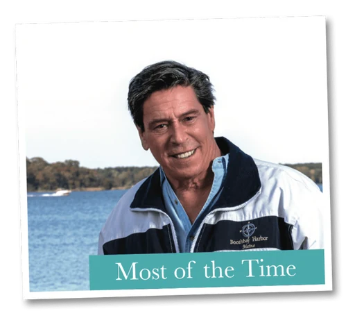 Oliver C. Brown outdoors by the water in a windbreaker, captioned “Most of the Time”